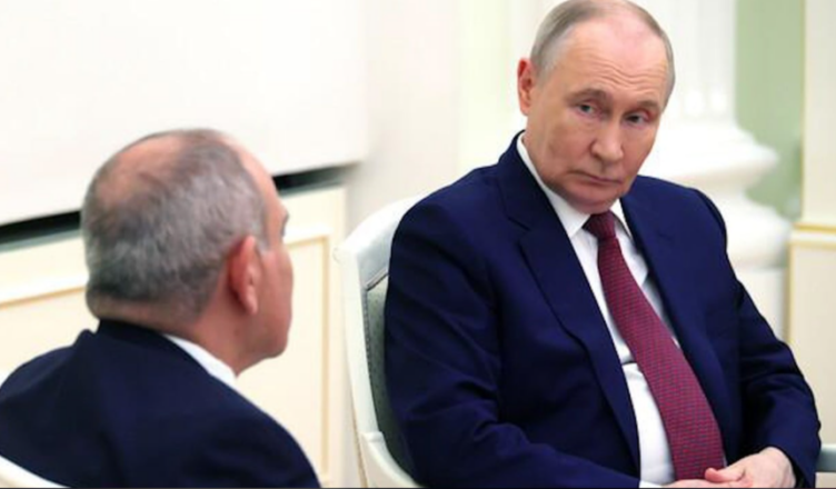 Путин