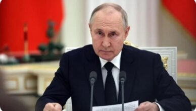 Путин