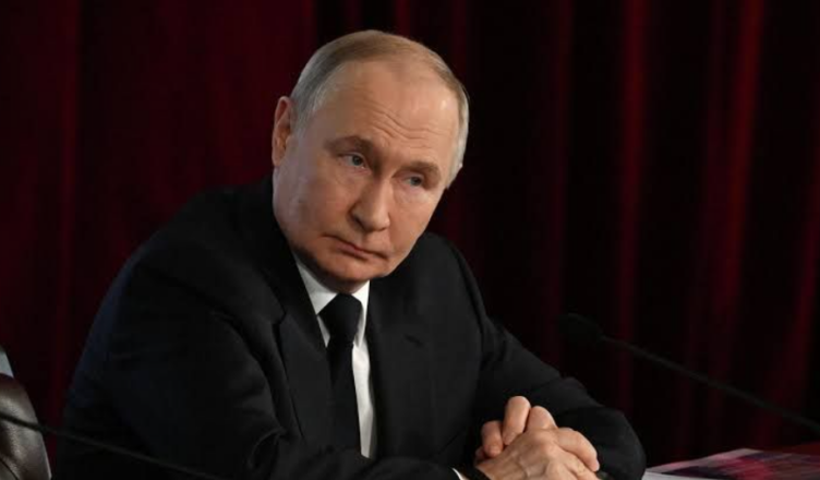 Путин